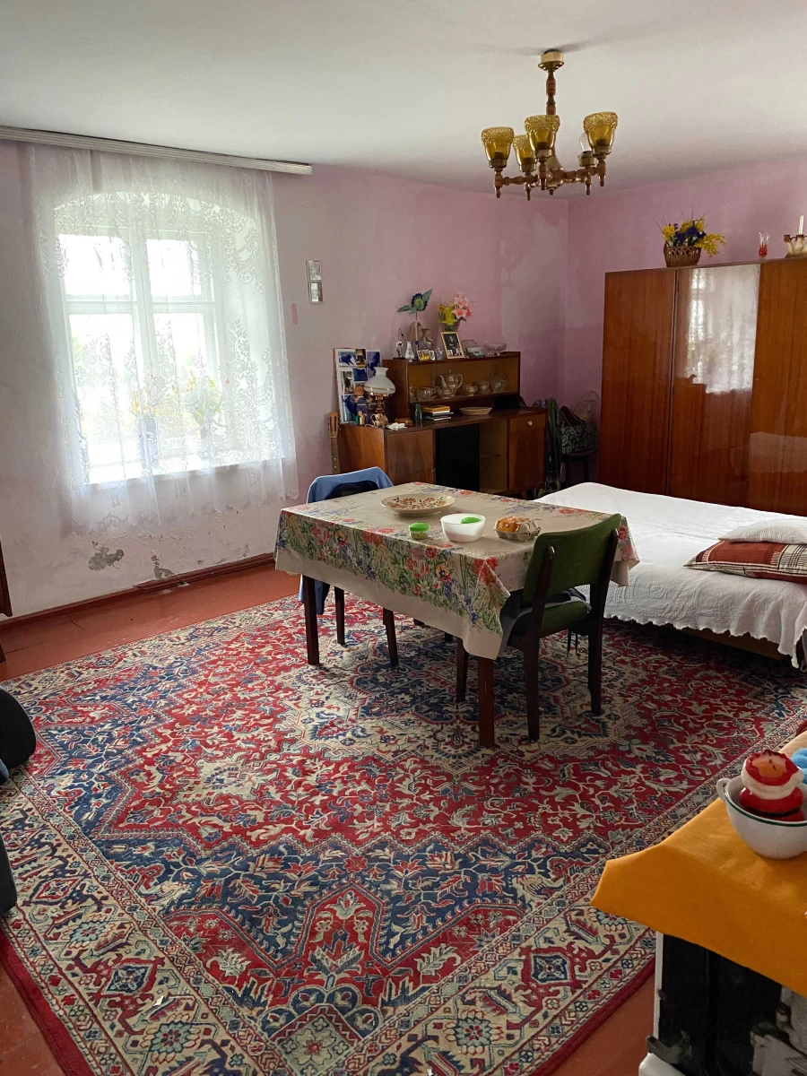 Poniemiecki dom z działką w zabudowie zagrodowej Ratajno