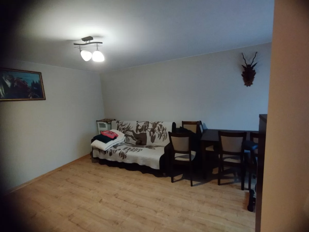 Wynajmę apartament z aneksem kuchennym łazienka pokój z sypialnią