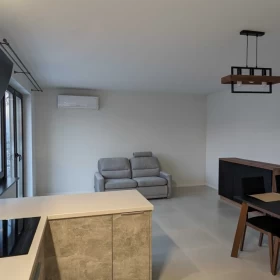 Wynajmę mieszkanie 80m2, salon, dwie sypialnie, ogród, użytkowe poddasze Jeżów Sudecki