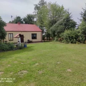 Siedlisko z domem i ogrodem [możliwość dokupienia 4,17 ha pola