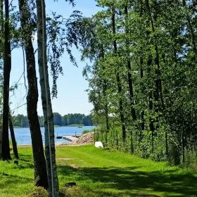 Sprzedam działkę budowlaną koło Piszu w Rostkach z dostępem do jeziora