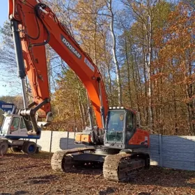 Koparko-ładowarka Doosan DX340LC-5